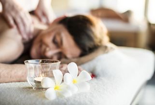 lady receiving a massage on a deep healing holiday